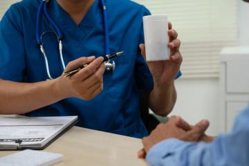 Doctor instructing patient about a penile implant video