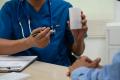 Doctor instructing patient about a penile implant video